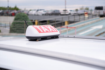 Taxi at the airport waiting for passengers during a cloudy afternoon