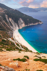 Myrtos beach , Kefalonia most beautiful and popular beach with turquoise Ionian sea in beautiful sunset