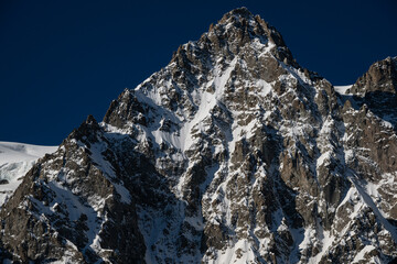 Glacier capped Mont Pelvoux in the Ecrins Mountains in the French Alps