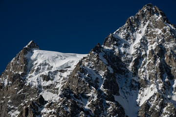 Glacier capped Mont Pelvoux in the Ecrins Mountains in the French Alps