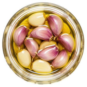 Pickled garlic cloves in oil isolated on transparent background