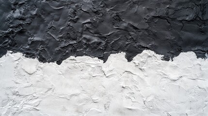 Fototapeta premium Kontrastowa faktura czarno-białej, pomalowanej ściany betonowej.