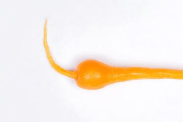 Unusual yellow chili pepper on white