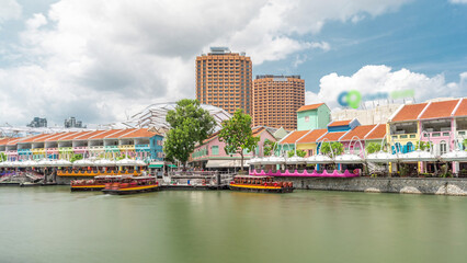 Tourist boats docking at Clarke Quay harbor timelapse hyperlapse.