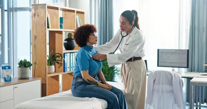 Doctor, patient and breathing with stethoscope in clinic for chest exam, lung capacity and checkup. Cardiology expert, women and medical tool for heartbeat, consultation and health assessment on bed