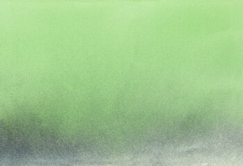silver color spray paint gradient on soft green color paper