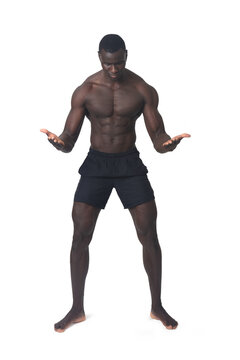 Front view of a man holding or lifting something imaginary at waist level on a white background
