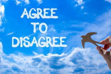 Agree to disagree symbol. Concept words Agree to disagree. Beautiful blue sky clouds background....