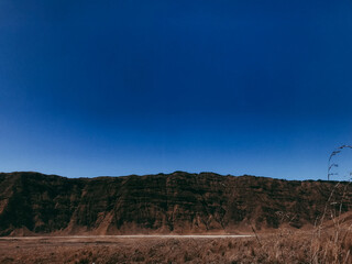 Vast Desert Landscape Awe-Inspiring Blue Sky Over Brown Mountains