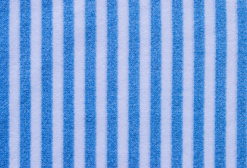 Soft white and blue stripe fabric texture or background	