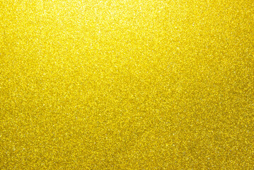 Golden glitter paper texture as background