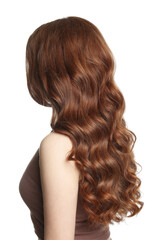 Fototapeta premium Teenage girl with healthy wavy hair on white background