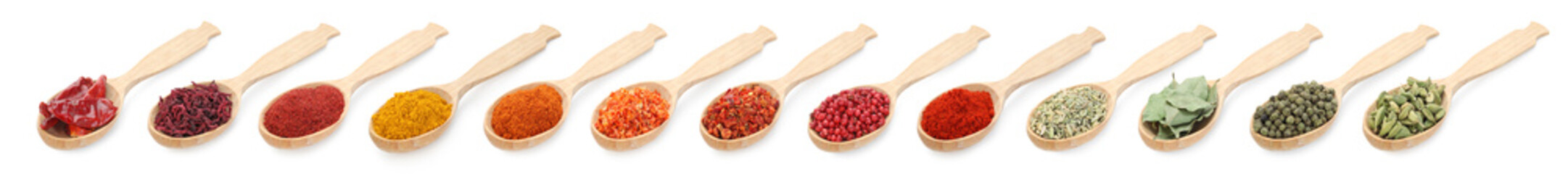 Different aromatic spices in wooden spoons on white background, set