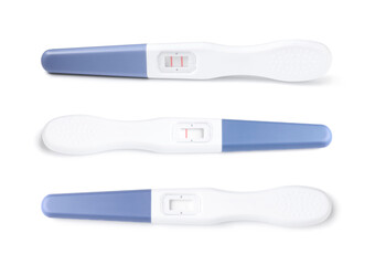 Three pregnancy tests with positive, negative and invalid results isolated on white, set