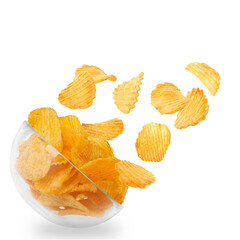 Tasty crispy potato chips falling into bowl on white background