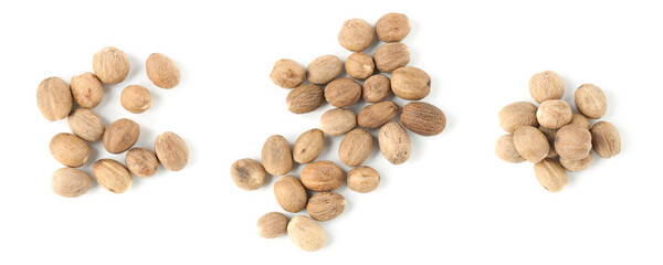 Nutmeg seeds on white background, set. Top view