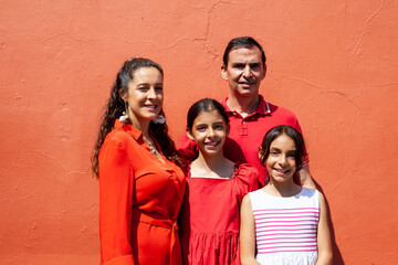 Young family of four traveling together. Family love concept. Travel concept. Cartagena de Indias.