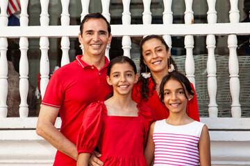 Young family of four traveling together. Family love concept. Travel concept. Cartagena de Indias.