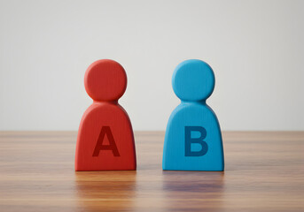 A b testing concept red and blue wooden figures a and b choice comparison decision making analysis
