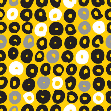 Doodle circles pattern illustration seamless. Hand drawn circular wrapper vector design in yellow, black, gray and white.