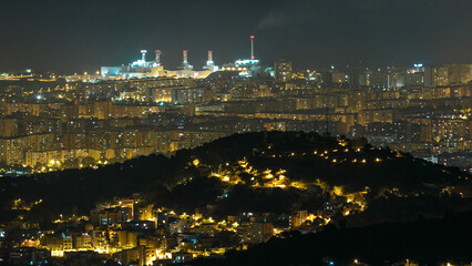Obraz premium Panorama of Barcelona night timelapse from Mount Tibidabo. Catalonia, Spain.