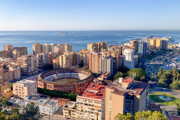 Savoring the stunning panoramic view of the vibrant city and bustling port while soaking in the...