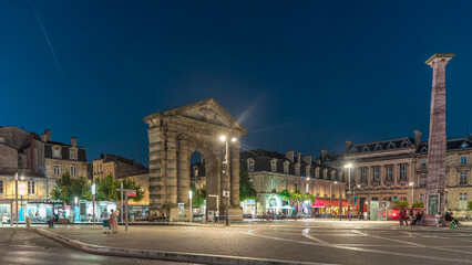 Fototapeta premium Porte d'Aquitaine arch and obelisk at Place de la Victoire day to night timelapse hyperlapse in Bordeaux, France.