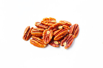 Delicious salted pecan nuts scattered.