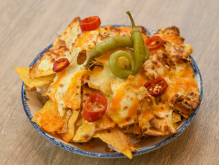 Nachos with cheese, jalapeno and chili pepper