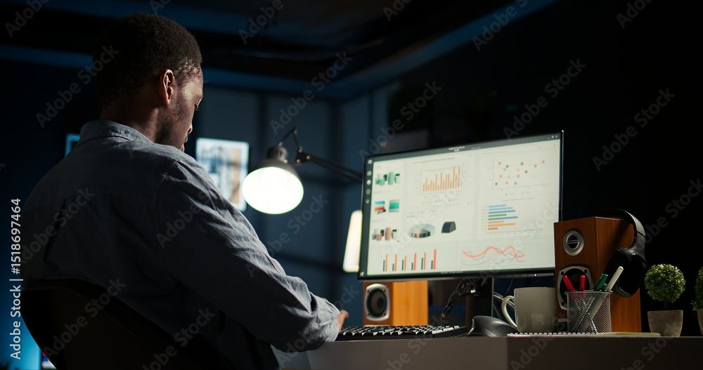 Poster network analyst studying digital commerce progression reports on computer, working at home to boost 