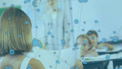 Child girl standing in classroom reading paper for education as building blue icon network overlay - Powered by Adobe