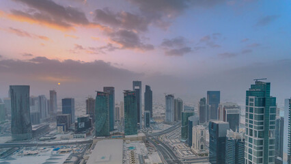 Skyscrapers at sunset timelapse in the skyline of commercial center of Doha, the capital Qatar