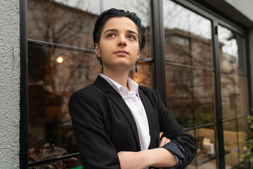 Portrait of young businesswoman in suit
