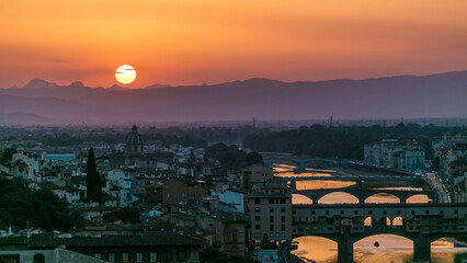 Skyline view of Arno River timelapse. Ponte Vecchio from Piazzale Michelangelo at Sunset, Florence,...
