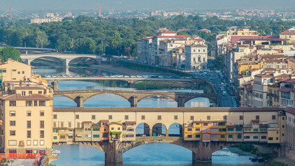 The Ponte Vecchio early morning timelapse, a medieval stone segmental arch bridge over the Arno River, in Florence, Italy