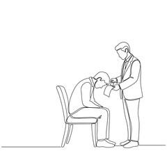 Man receiving bad news while sitting in a chair with a colleague