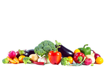 Fresh shiny multicolored vegetables isolated on white background.