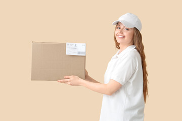 Female courier with parcel on beige background