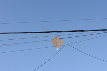 Kite stuck in electric cable