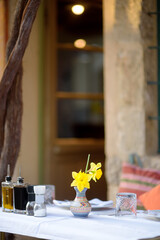 National restaurant tables on the street of the Old Bar Town in Montenegro