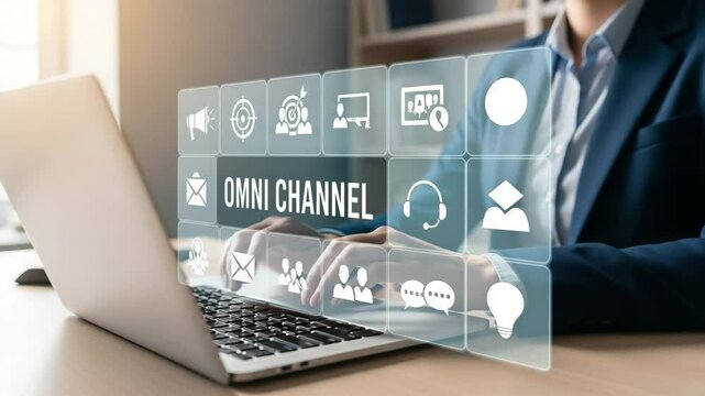 Person typing on laptop with omni channel interface and icons displayed above the keyboard area