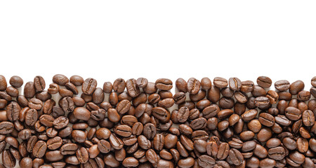 Many roasted coffee beans on white background. Coffee beans border with area for copy space. Close up images.