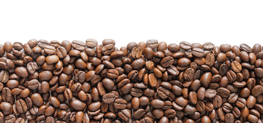 Many roasted coffee beans on white background. Coffee beans border with area for copy space. Close up images.