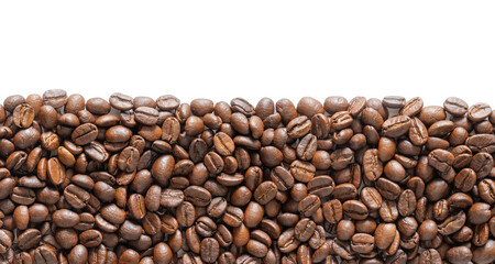 Many roasted coffee beans on white background. Coffee beans border with area for copy space. Close up images.
