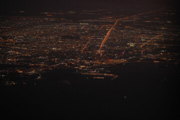 City skyline illuminated at night from above