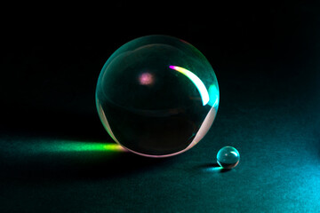 Close-Up of Glass Spheres in Vibrant Colorful Lighting