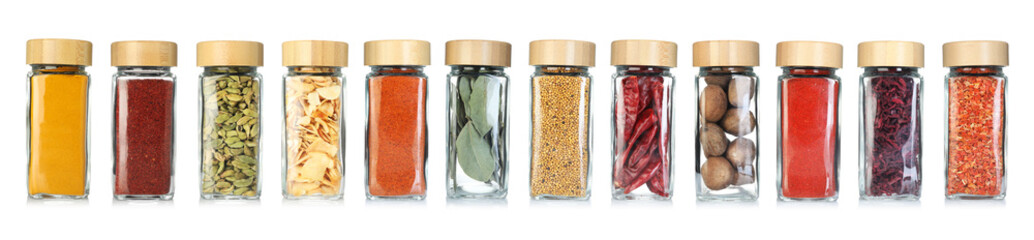Different spices in glass jars on white background, set