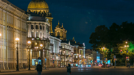 Fototapeta premium Saint Isaac's cathedral from the Palace square night timelapse in Saint Petersburg, Russia.