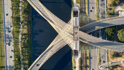 Top view of cable-stayed bridge, Marginal Pinheiros, and Pinheiros river in Sao Paulo city. 