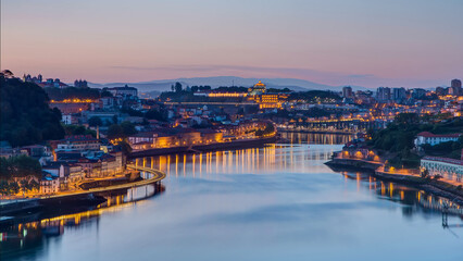Obraz premium Aerial view before sunrise at the most emblematic area of Douro river timelapse.